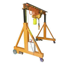 Adjustable gantry crane for industrial operations